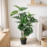 Plante artificielle Monstera verte en situation