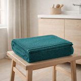 Drap de bain Bora Paon 90 x 150 en situation