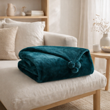 Plaid Tender pompons Paon 130 x 170 en situation