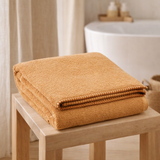 Drap de bain Bora Moutarde 90 x 150 en situation