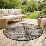 Tapis Catania 2 outdoor Noir Diamčtre 160 cm en situation