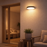 Lampe murale extérieure LED Mio Ø 17,5 cm en métal et plastique colorants en anthracite, IP54 pour l'entrée, le balcon, la terrasse en situation