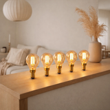 Lampe à LED 5 set avec E14 version 4 Watts, en métal et en verre, ambre en situation