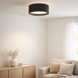 Spot LED trios Ø 14 cm noir, en métal et en plastique avec des LED intégrées en situation