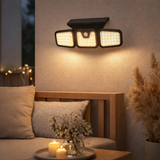 Lampe à paroi extérieure solaire LED Pacita, lampe à paroi extérieure multifonctionnelle en plastique en noir, 28,3 x 13,5 x environ 11 cm cm en situation