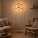 Lampe debout Orion env. 165 cm de haut, fait de métal et de verre de couleur en laiton à Amber, G9 Base, éclairage pour le salon, la salle à manger ou le bureau. en situation