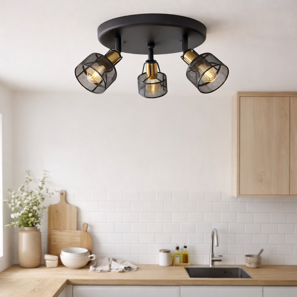 Mur à 3 places et plafond Rondel Spot Foro en métal en noir et or, avec des versions E14, 41 cm de diamètre. Éclairage élégant pour le salon, la salle à manger ou la cuisine. en situation