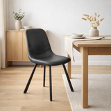 Chaise bari noir tissu vintage noir en situation
