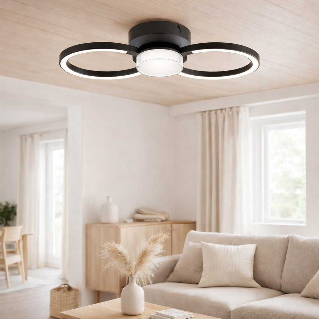 Le plafond LED CIMO en métal noir et en plastique, Ø Env. en situation