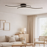 LED Mur / plafond Onda, plafond en métal et plastique en noir, avec des LED fermement intégrées, éclairage pour le salon, la salle à manger ou le bureau de 65 cm de long en situation