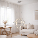 Le pendentif LED Cosmos métal et plastique en chrome, Ø60 cm, avec des LED fermement construites, éclairage pour le salon, la salle à manger ou le bureau. en situation