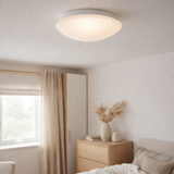 Plafond LED en métal et en verre en blanc, avec des LED-in Fermement construites Ø Env. 29 cm. en situation