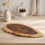 Tranche d'arbre de planche de service collé 34x16cm ou 52x24cm de service décoration comprimé acacia massive en situation