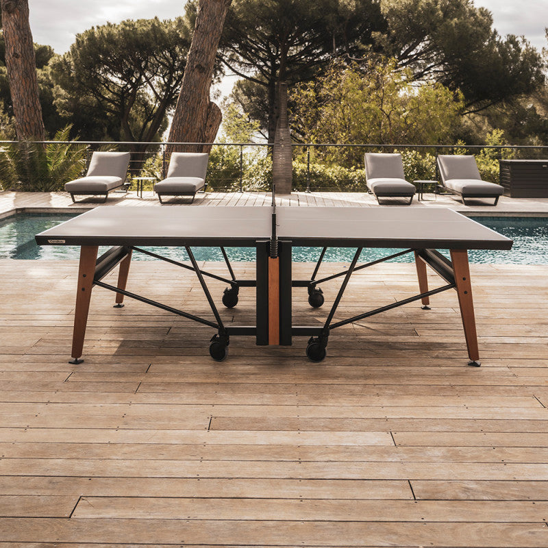 Table de ping-pong Origin Move déployée dans un jardin
