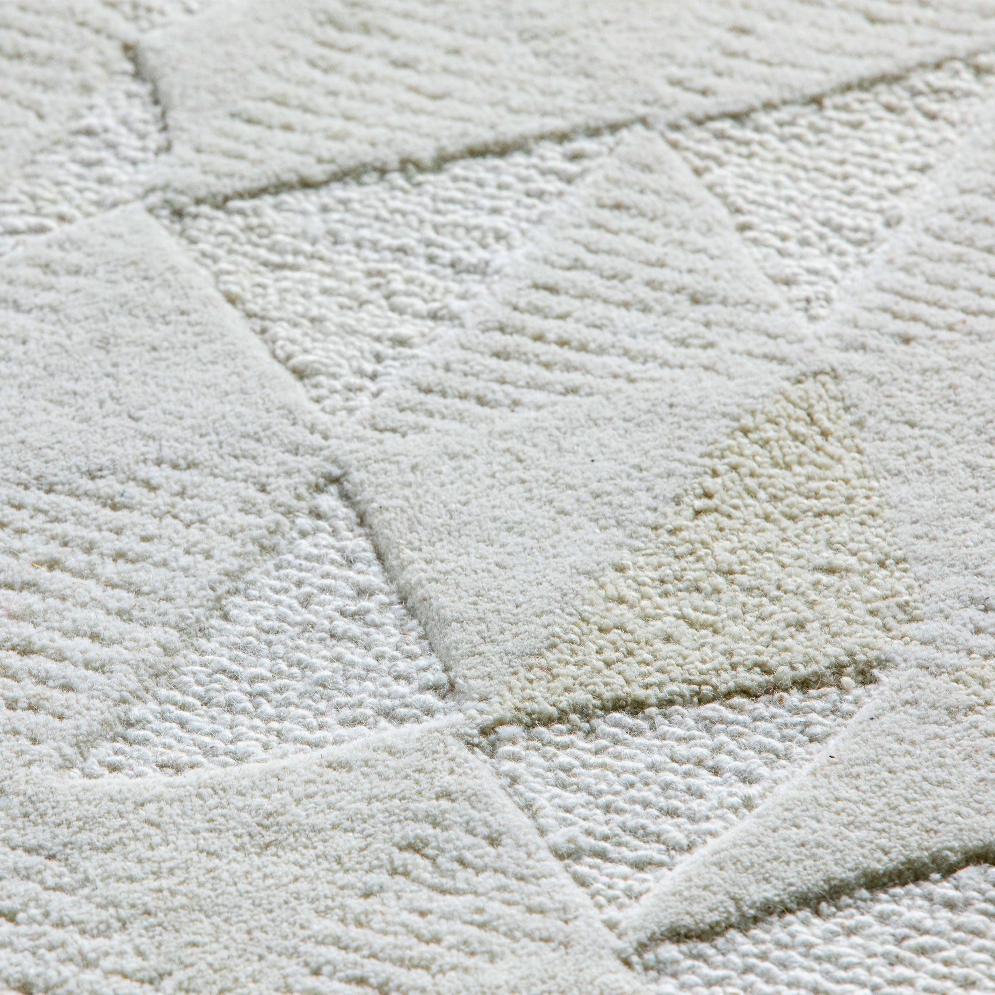 Détails des bouclettes et fils coupés du tapis Bhoutan