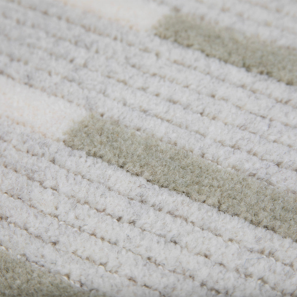 Détail du tissage raffiné du tapis Stabio en 100 % laine