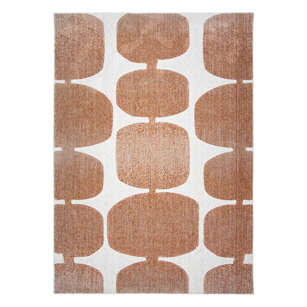Tapis Pearl associé à un mobilier en bois clair.