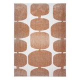 Tapis Pearl associé à un mobilier en bois clair.